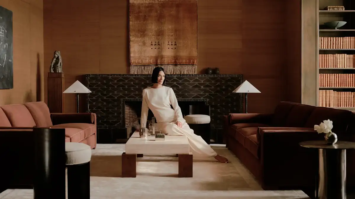 Athena Calderone’s new collection with Crate & Barrel features rich oxblood sofas.